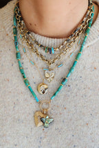 Small 14K Gold Carved Abalone Thunderbird Charm