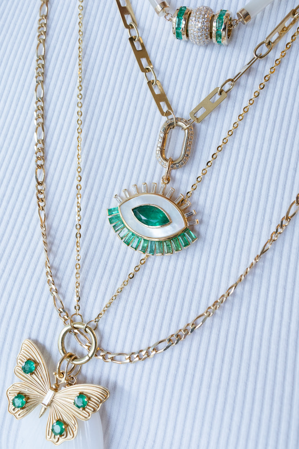 14K Gold Mother of Pearl Baguette Emerald Evil Eye Charm